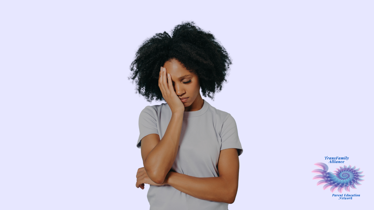Parent standing against a lilac purple backdrop with a facial expression that conveys, My kid came out as non-binary and I feel completely lost