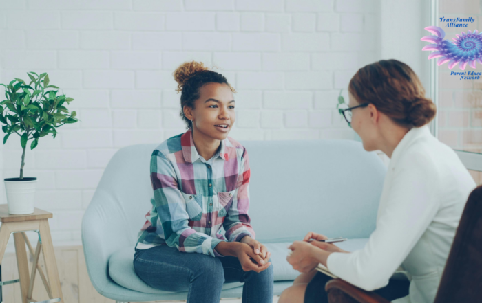 Young person sitting on couch with a therapist, getting real answers to their question, What is Gender Affirming Care?