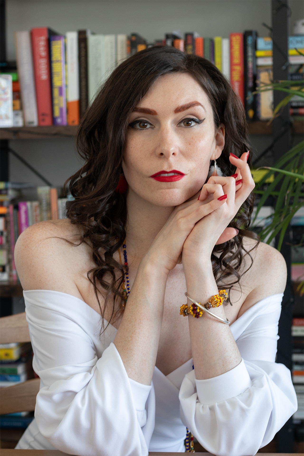 Portrait of author, filmmaker, and historian Morgan M Page, posing for promotion of her upcoming expert training with the TransFamily Alliance: Trans History for Friends and Family